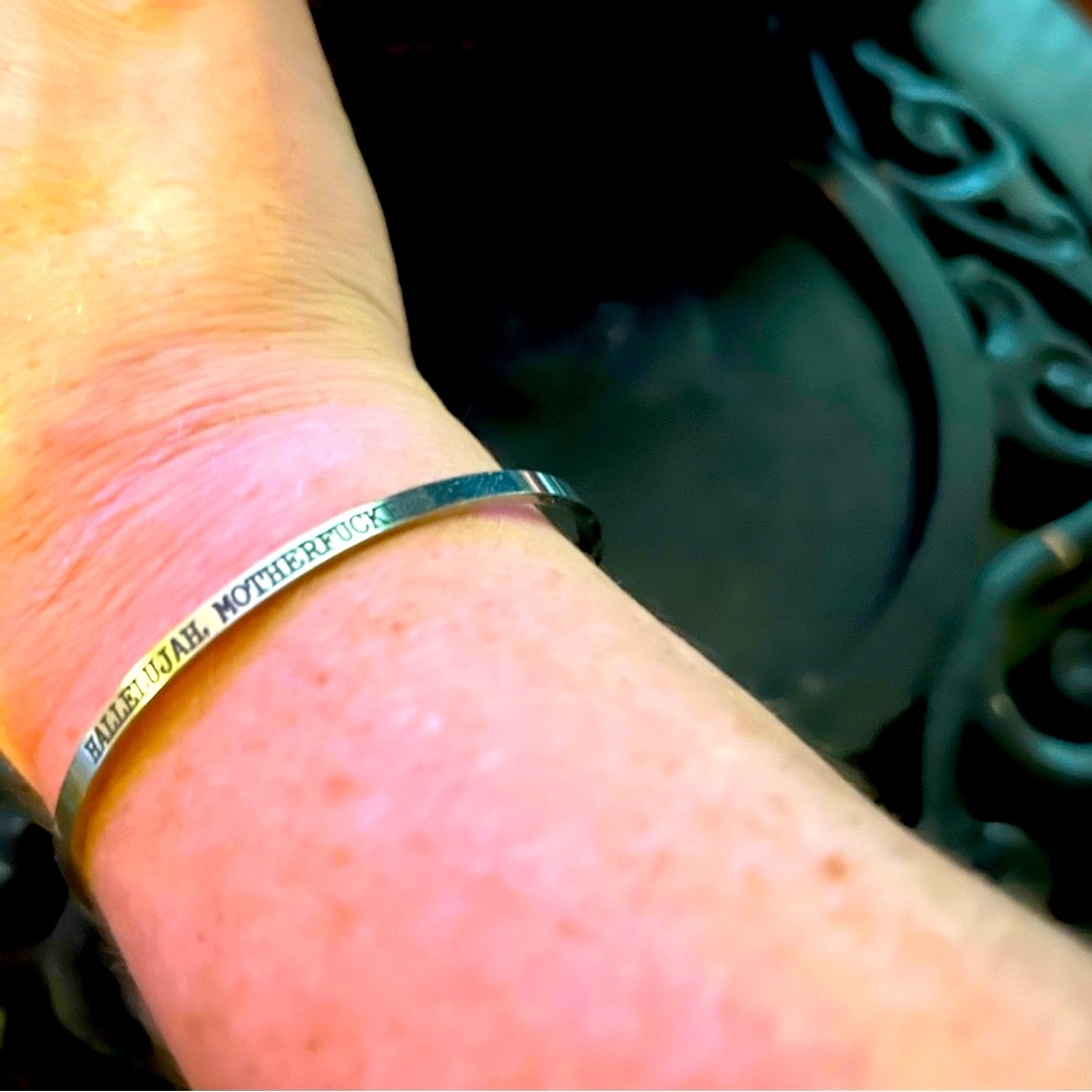 Sterling silver bracelet, engraved “hallelujah motherfuckers”